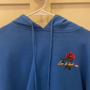 Blue LOVE TO HATE ME cropped hoodie